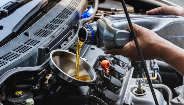Pouring Engine Oil